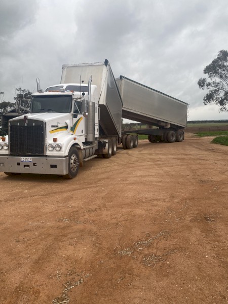 2010 Kenworth T408 Quad dog fitted with a blower. 