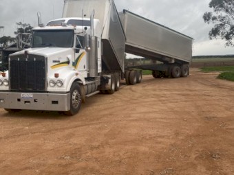 2010 Kenworth T408 Quad dog fitted with a blower. 