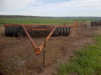 International 511 combine with roller and harrows