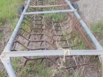 International 511 combine with roller and harrows