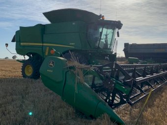 2015 John Deere S680 with 640D Front