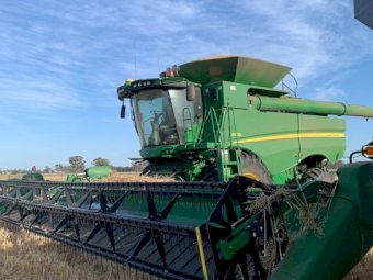 2015 John Deere S680 with 640D Front