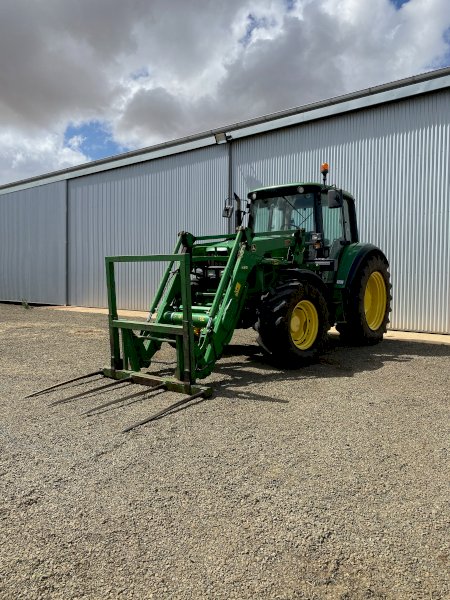2009 John Deere 6330 with H310 FEL