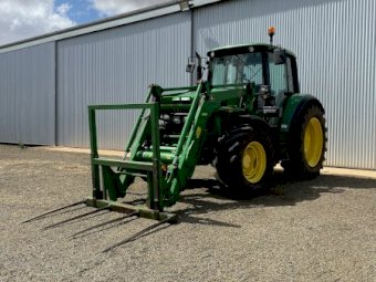2009 John Deere 6330 with H310 FEL
