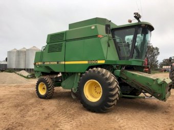 John Deere 9600 with 36ft Tin Front with Trailer