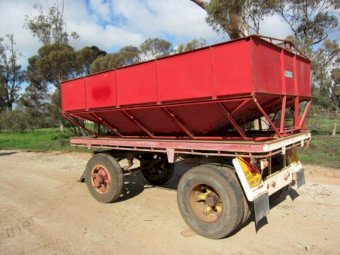 Flat Top Dog Trailer with removable Dunstan Grain Bin.