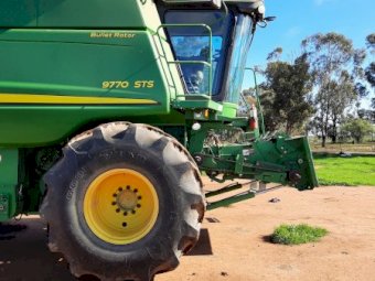 2012 John Deere 9770 STS 4WD with 2012 John Deere 640D Front (40ft) & Trailer