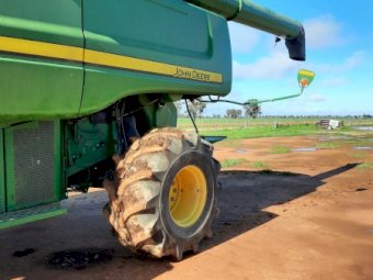 2012 John Deere 9770 STS 4WD with 2012 John Deere 640D Front (40ft) & Trailer