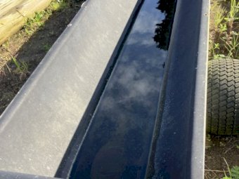 Feed troughs on wheels and with tow bar