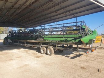 2016 John Deere S660 Header with 640 D Front and Trailer Negotiable.  "Price Drop"