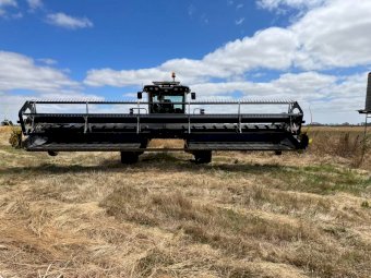 2012 Massey Ferguson 9760 Windrower with 30 ft AgCo Draper Front