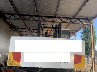 1984 Nissan Carrier with P & H 180B Mobile Crane