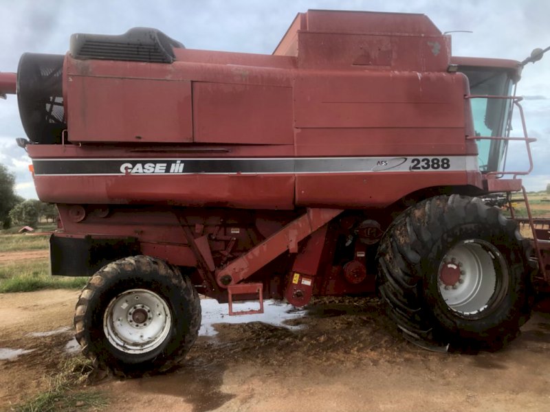 Under Auction - (A191) 1999 Case 2388 with 30 ft Comb & Trailer 