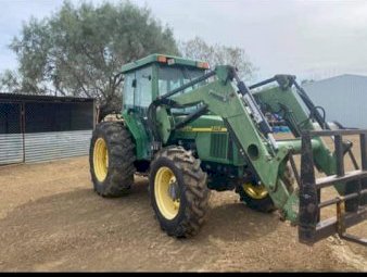 1995 John Deere 5510 Tractor with Loader & Forks