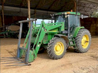 John Deere 7410 with JD 740 Loader