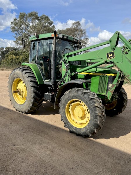 John Deere 7410 with JD 740 Loader