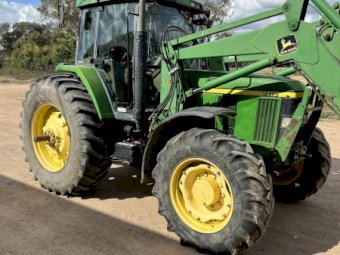John Deere 7410 with JD 740 Loader