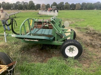 Hustler Hay bale feed out cart