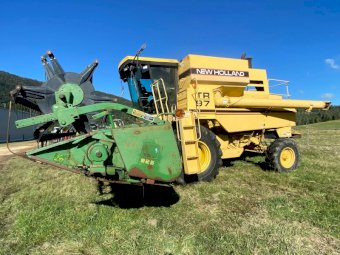 New Holland TR97 Harvester with John Deere 24ft Stainless Front