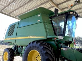 John Deere 9750 STS Header with 936D Draper Front on Trailer