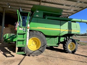 John Deere 9750 STS Header with 936D Draper Front on Trailer