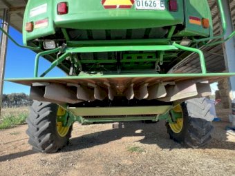 John Deere 9750 STS Header with 936D Draper Front on Trailer
