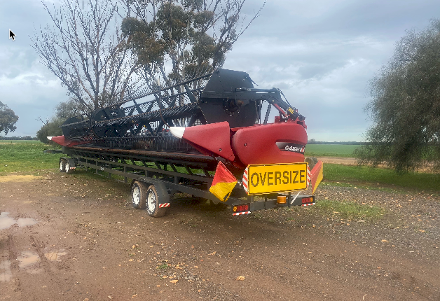 2015 Case IH 3152 45ft Header Front with Midwest Contractors Trailer
