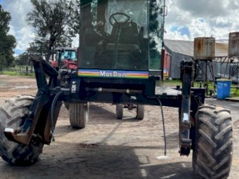 1996 MacDon 9300 Windrower with 25ft Front
