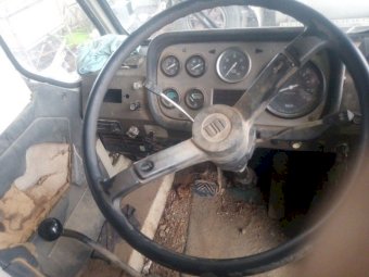 1984 Nissan Carrier with P & H 180B Mobile Crane