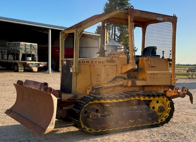 Komatsu  D31A Dozer with stick rake and Tree push