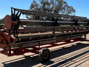 24' Case 810 Front on Trailer