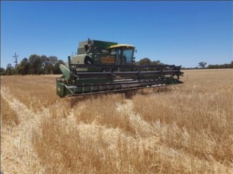 John Deere 8820 Header with 30ft Tin Front | Farm Tender