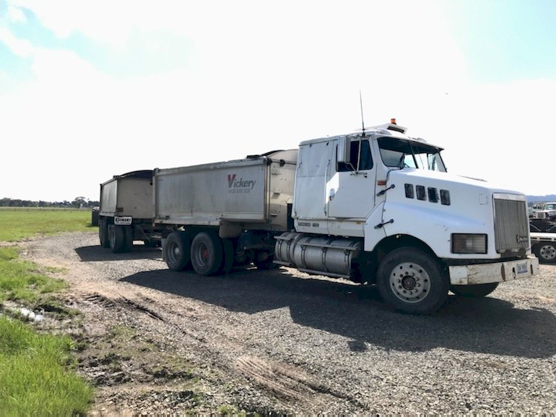 Under Auction - (A205) 1998 International Transtar Truck and Dog Trailer 