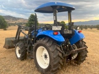 2004 New Holland TD65D Tractor with Quicke Loader