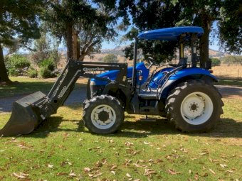 2004 New Holland TD65D Tractor with Quicke Loader
