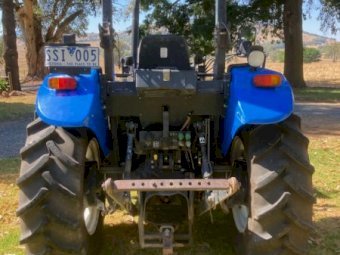2004 New Holland TD65D Tractor with Quicke Loader