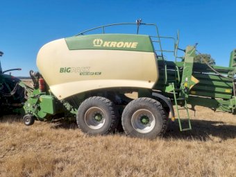 2015 John Deere 8295R Tractor with a 2017 Krone 1290 Big Pack Baler