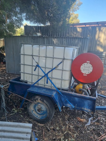 6x5 Box Trailer with Tank and Firefighter