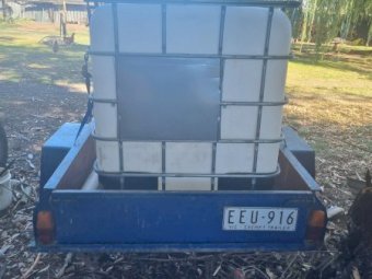 6x5 Box Trailer with Tank and Firefighter