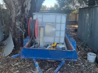 6x5 Box Trailer with Tank and Firefighter