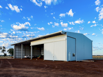 Action Steel Machinery Shed with one-bay enclosed