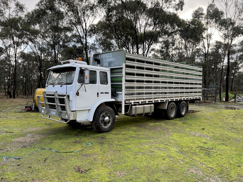 Under Auction - 1994 International Acco  2350 C Truck with 2 deck sheep crate 