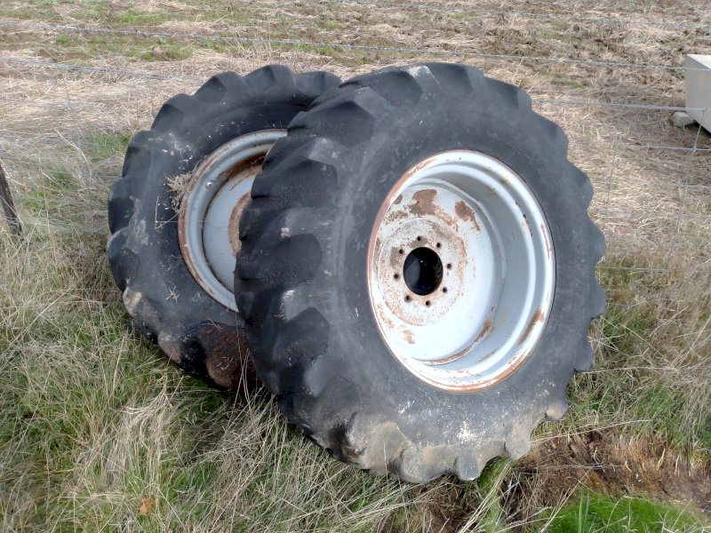 2 Used rims and 14.9 x 24 tyres