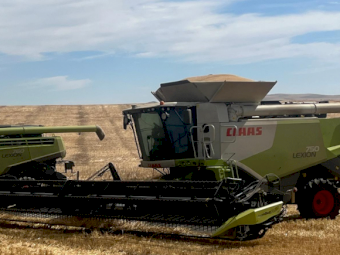 2012 Claas Lexion 750 Terra Trac Header with 45ft Draper Front and Trailer