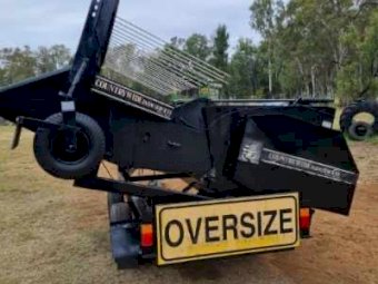 Countrywide 2000 series Canola Pickup front with Transport Trailer