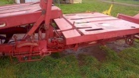 Under Auction - New Holland 1012 PTO Trailing Stackliner 