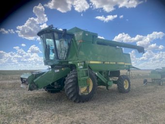 John Deere 9600 Header with 30' Tin Front and Trailer