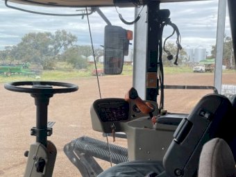 2011 MacDon M150 Windrower