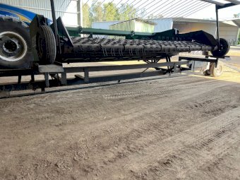 Phillips Swathmaster with Comb Trailer