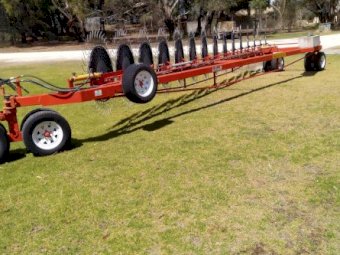 Schinckel 15 wheel one way hay rake